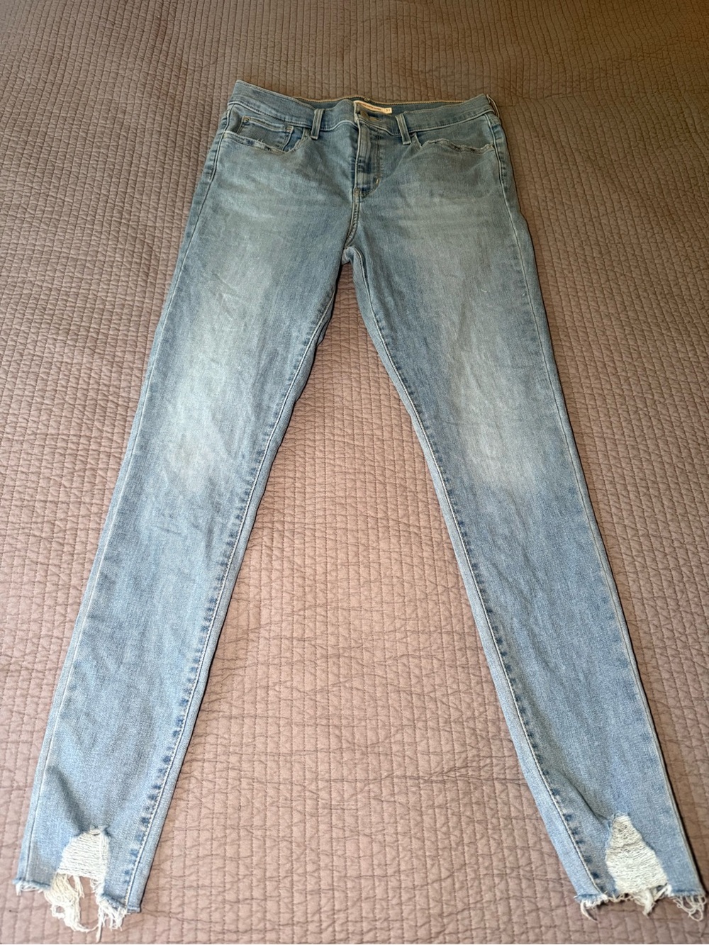 Levi's 720 High Rise Super Skinny Women's Jeans with Distressed Ankles